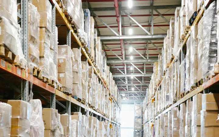 Storage racks with packaged goods, illustrating warehousing services.